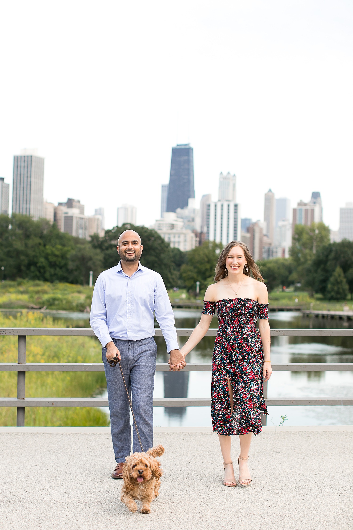 Couple walks with dog during Lincoln Park engagement session